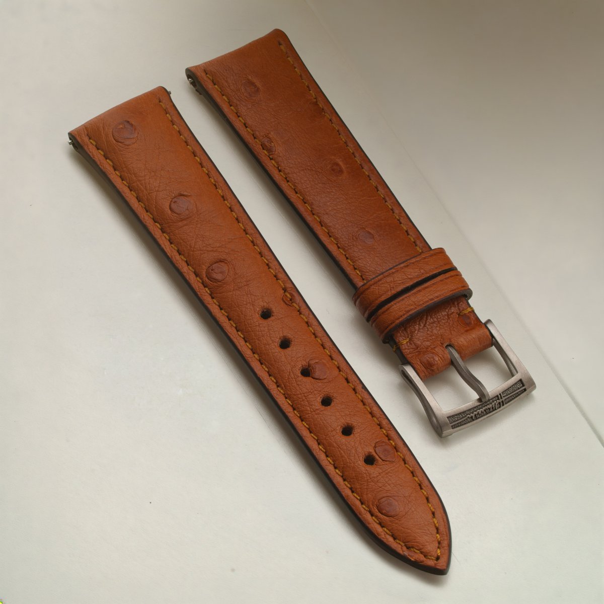 Ostrich Cognac diagonal strap view