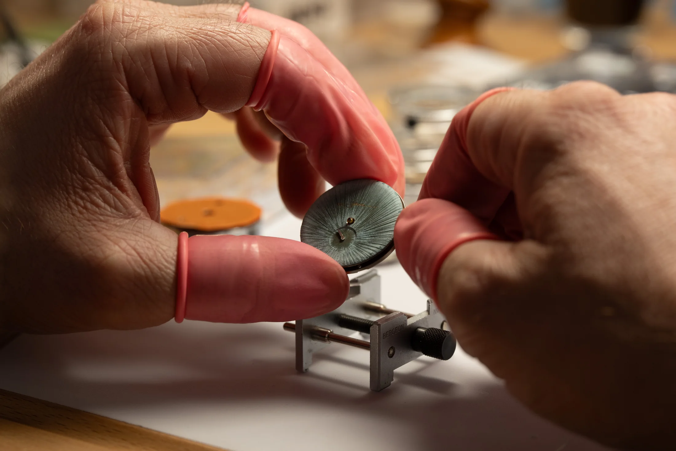 Hands working on a LAB Series 1.S dial in the Delft atelier